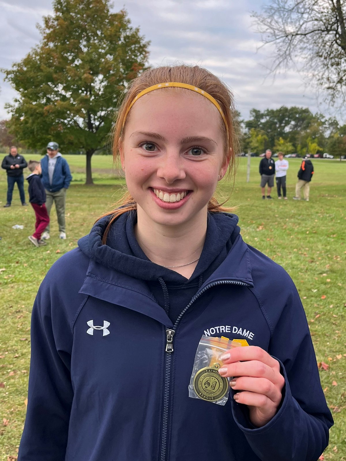 Toledo Notre Dame Academy senior Natalie Chryst was the individual champion, winning the five-kilometer race at Kensington Metropark’s Possum Hollow course on Oct. 11. (Photos courtesy of the Catholic High School League)