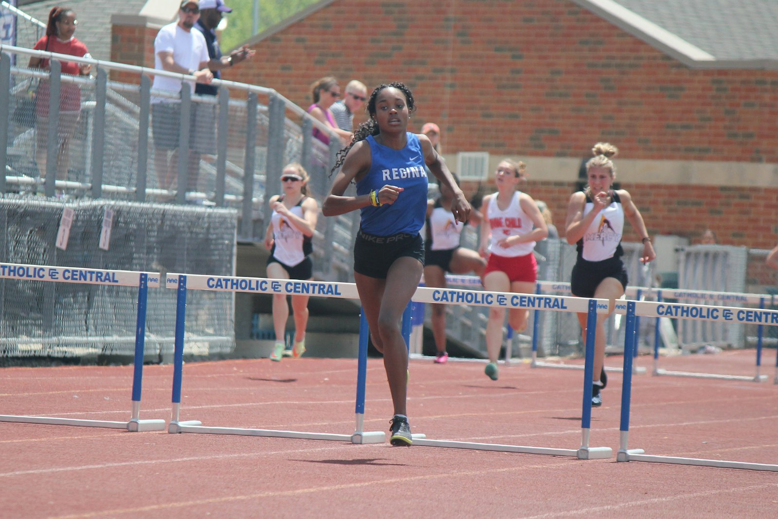 Warren Regina hurdler Ella Jenkins won the 300 low hurdles (44.99) and was runner-up in the 100 high hurdles (14.97) at the Division 2 meet. (Photo by Wright Wilson | Special to Detroit Catholic)