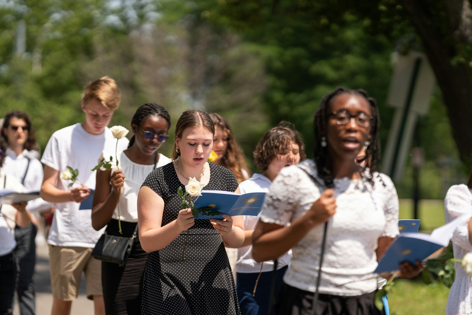 Catholics take part in a two-mile Eucharistic procession from the Cathedral of the Most Blessed Sacrament to Sacred Heart Major Seminary in Detroit during the solemnity of Corpus Christi, June 19, 2022, which kicked off the three-year National Eucharistic Revival in the Archdiocese of Detroit. (Melanie Reyes | Special to Detroit Catholic)