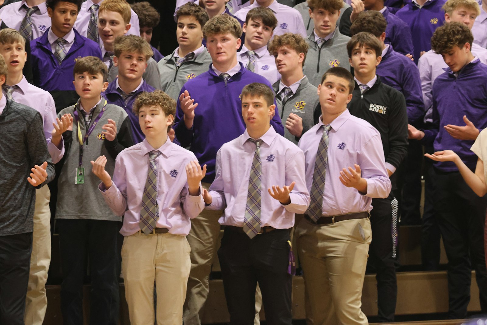 De La Salle students pray during the blessing of a new STEM innovation center at the school, which will open next year in anticipation of the school's 100th anniversary.