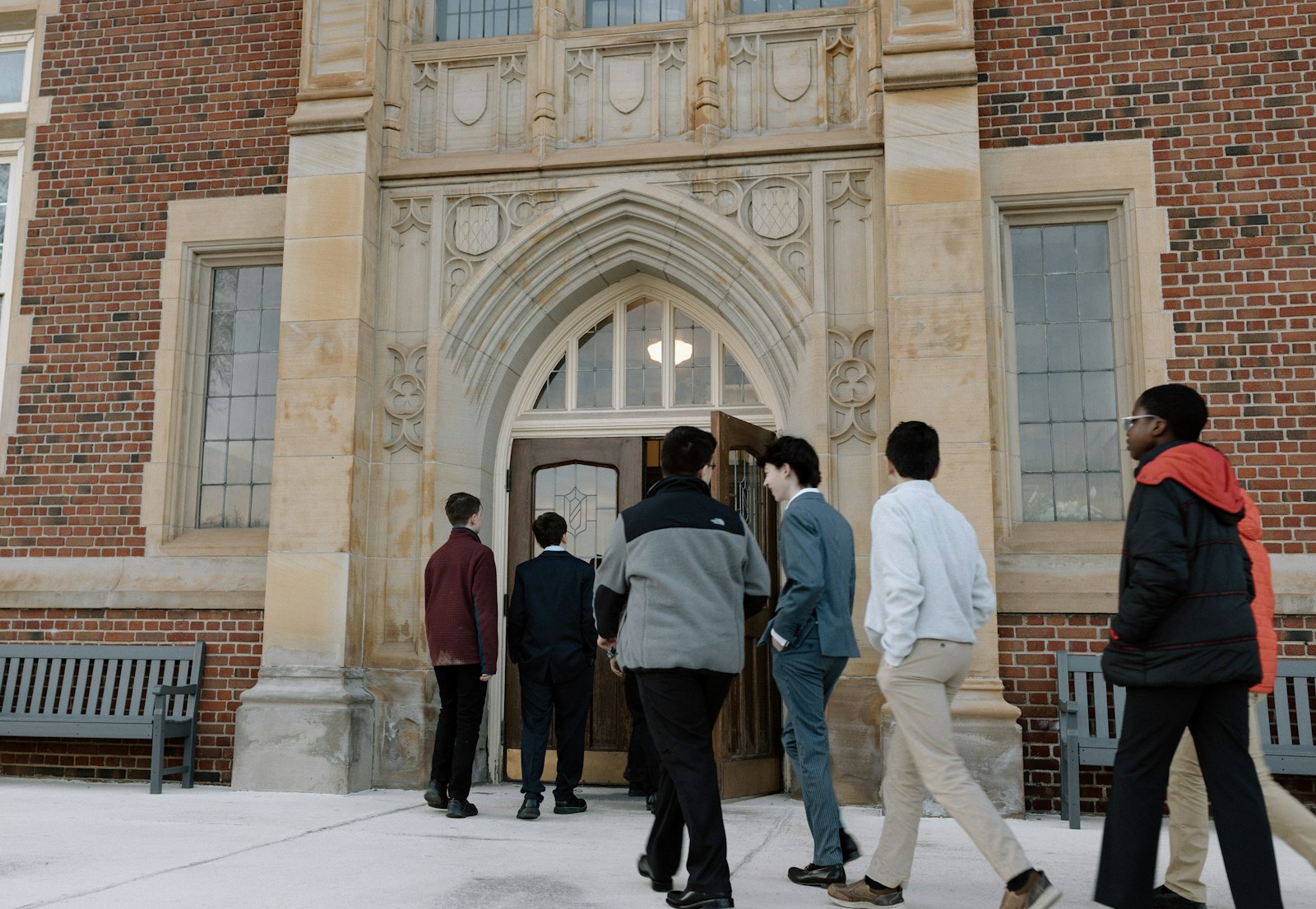 Young men file into the doors of Sacred Heart Major Seminary. Fr. Craig Giera, director of priestly vocations for the Archdiocese of Detroit, said the evening was about dispelling misconceptions about seminary life and priestly discernment, and encouraging young people to seek God's plan in prayer.