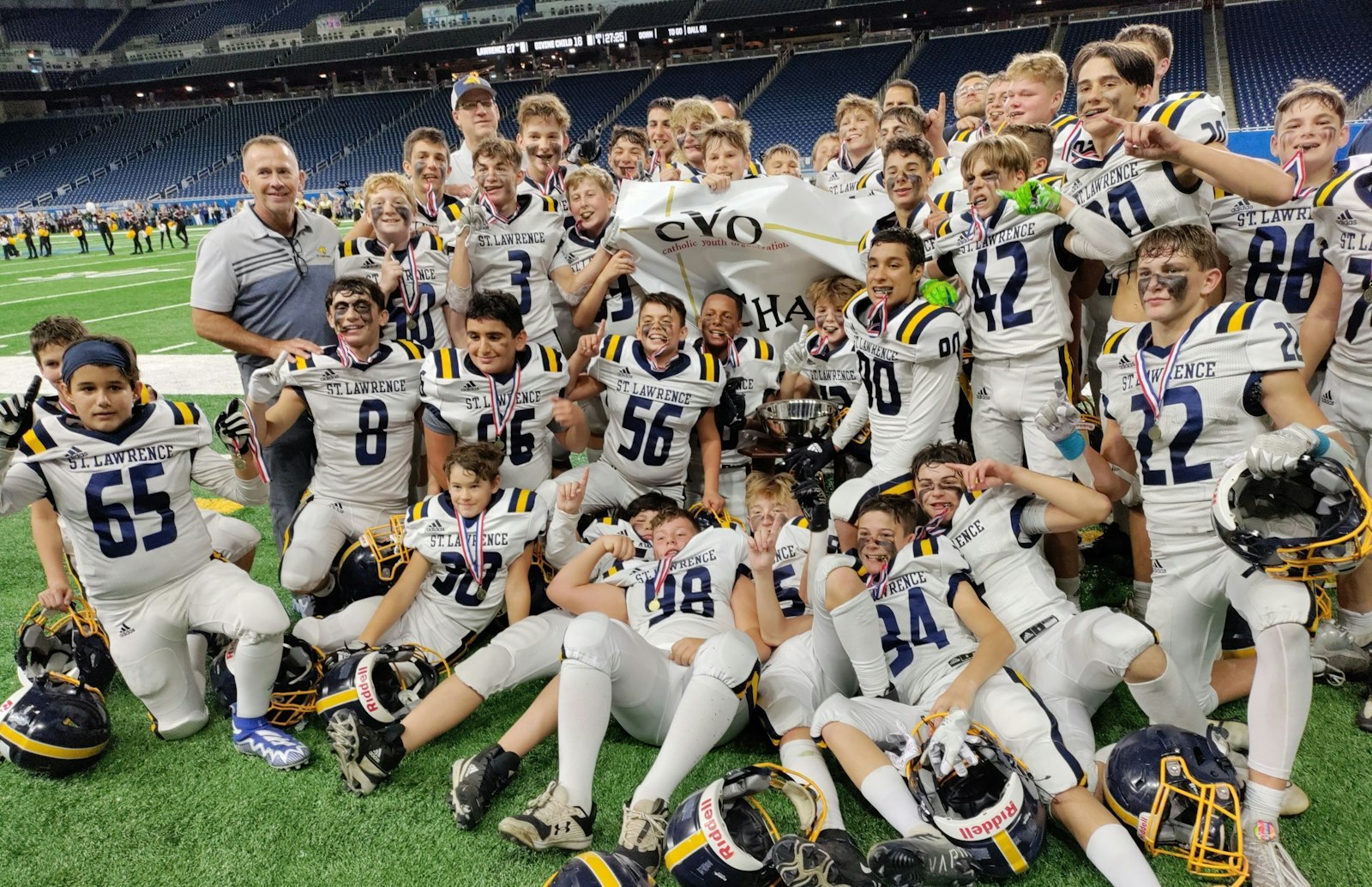 CYO A-B DIVISION CHAMPS: Utica St. Lawrence won its first CYO football championship by beating Dearborn Divine Child, 27-16, in the Prep Bowl at Ford Field. This fall, more than 1,350 students participated in CYO football on 54 teams at fourth, fifth-and-sixth, and seventh-and-eighth-grade levels. In total, the archdiocesan-wide CYO athletics program offers students in grades 4 thru 8 opportunities to participate fall, winter and spring in 11 sports.