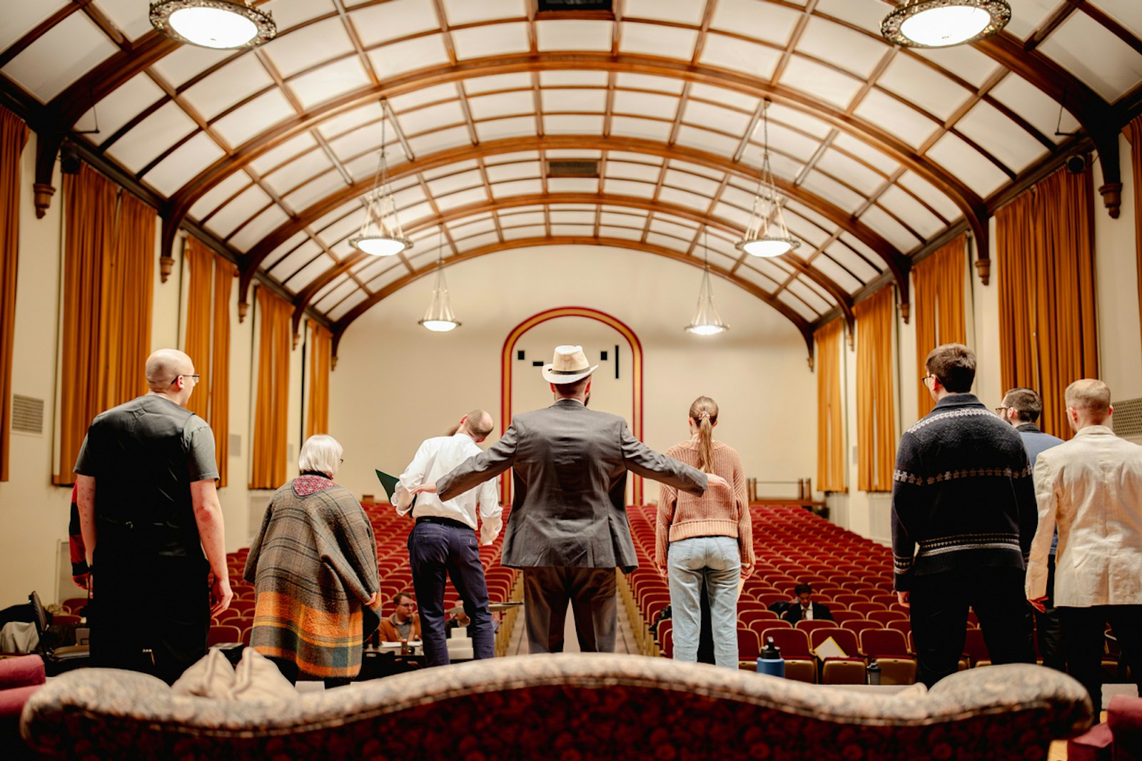 Seminarians and actors rehearse in an empty auditorium before a performance of "The Bluff" in March 2024. (Alissa Tuttle | Special to Detroit Catholic)