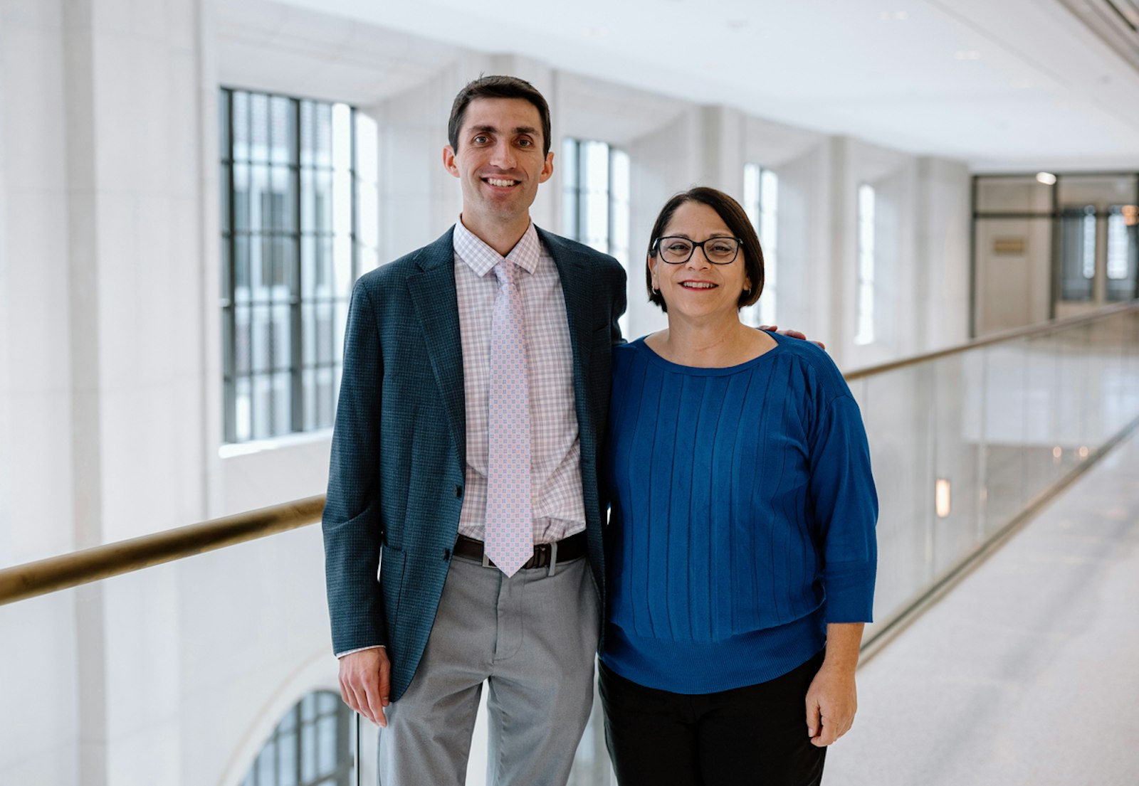 Theology teachers Colin Whitehead, left, and Rebecca Joseph lead Catholic Central's OCIT program, which Joseph said helps prevent students interested in becoming Catholic from "falling through the cracks."