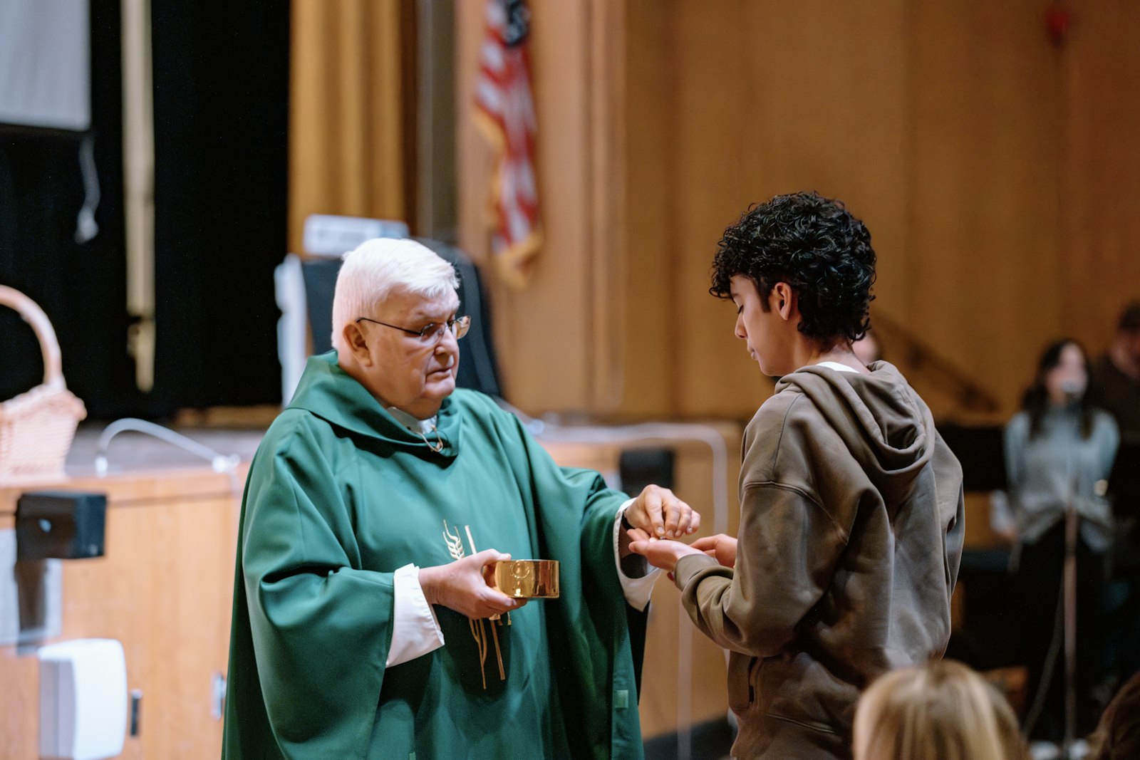 Bishop Quinn relayed a story about his great-nephew, using a metaphor about going "up the down escalator" to encourage teens to be a light in their communities, even if those communities aren't following Christ. (Alissa Tuttle | Special to Detroit Catholic)