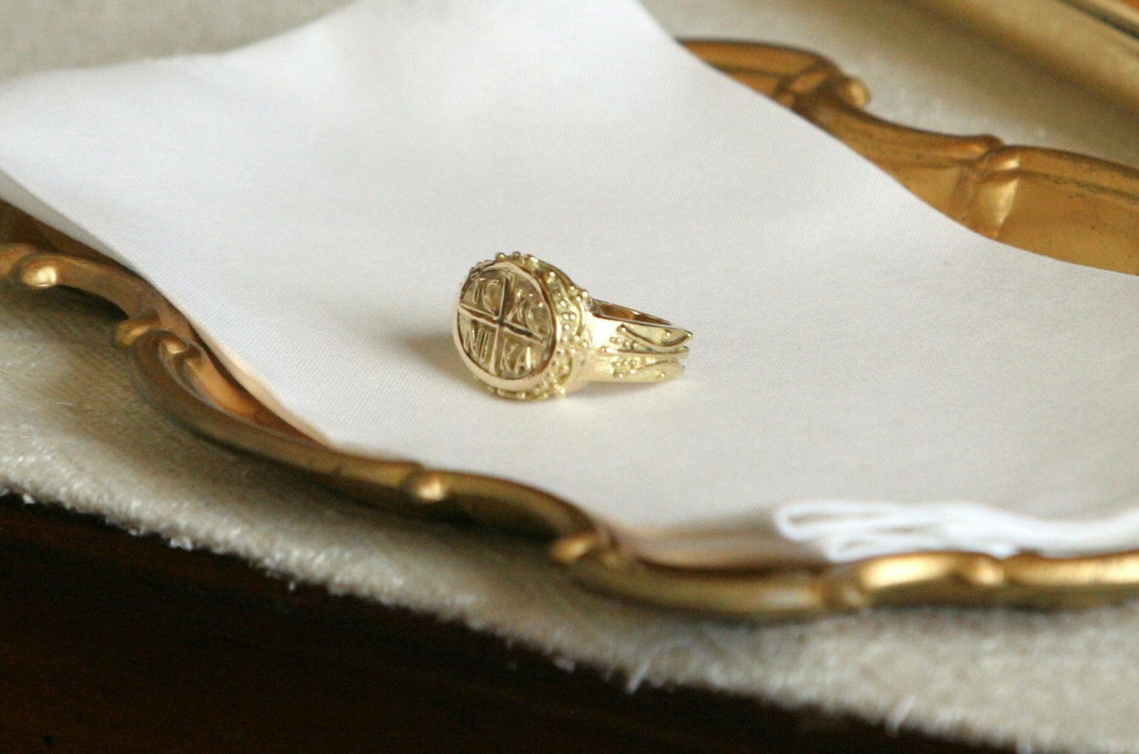 An episcopal ring sits on a plate in the sacristy of St. Agnes Cathedral in Rockville Centre. (Gregory A. Shemitz, Long Island Catholic | CNS photo)