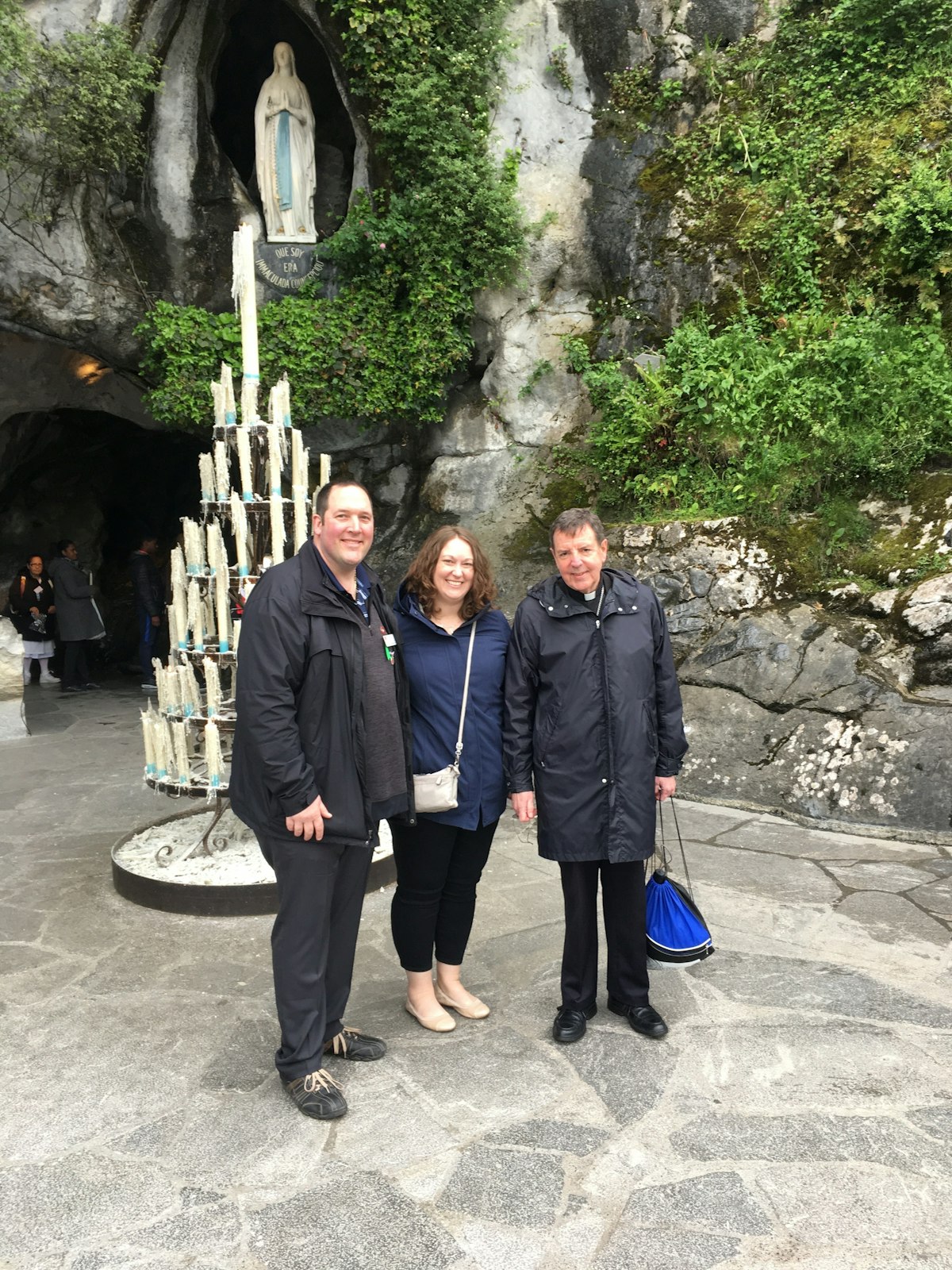 Amanda and Jason Cavanaugh are pictured near the healing shrine of Our Lady of Lourdes in Lourdes, France, with Detroit Archbishop Allen H. Vigneron in 2018.