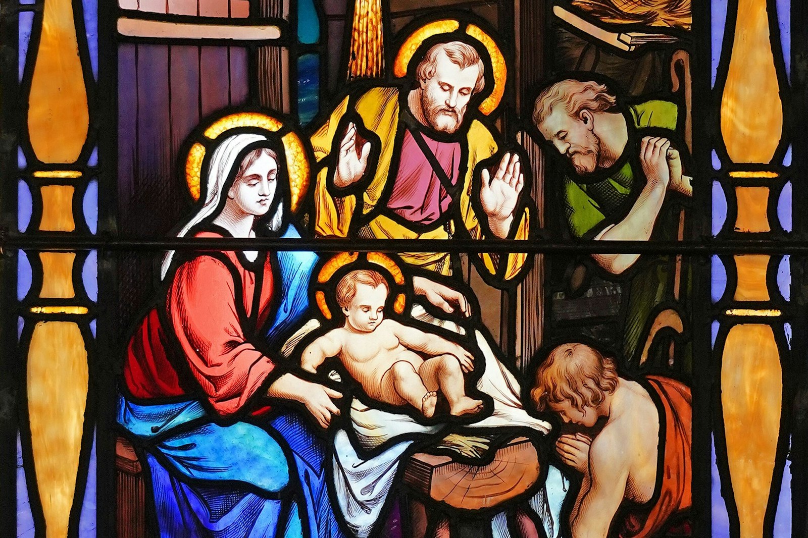The birth of Jesus is depicted in a stained-glass window at St. Mary of the Isle Church in Long Beach, N.Y. (CNS photo/Gregory A. Shemitz)