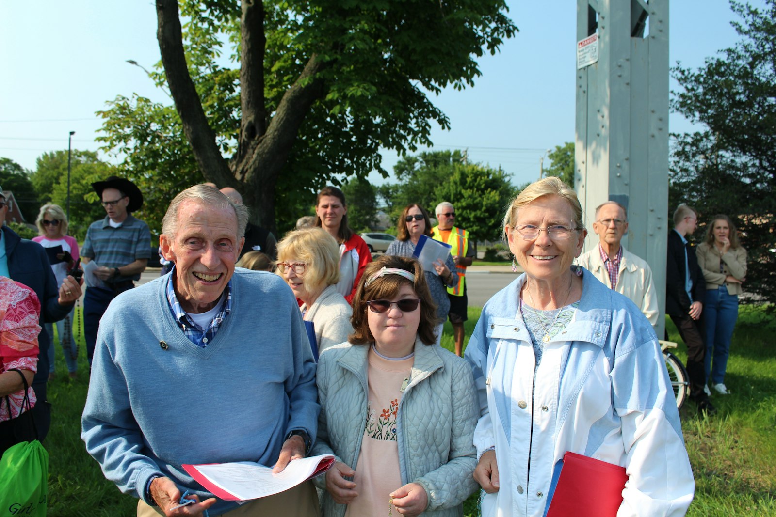 Dan Goodnow, left, participates in a prayer vigil in 2021 alongside volunteers from Helpers of God's Precious Infants. (Photo by Dianne Korzeniewski, courtesy of Helpers of God's Precious Infants)