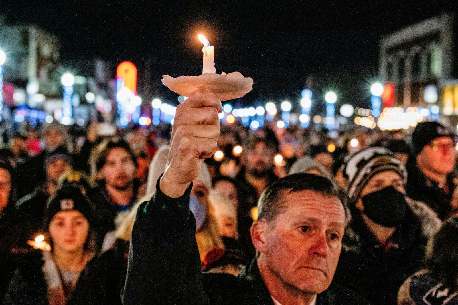 People in Oxford, Mich., gather for a vigil Dec. 3, 2021, to remember the students killed in a mass shooting at Oxford High School. (CNS photo/Seth Herald, Reuters)