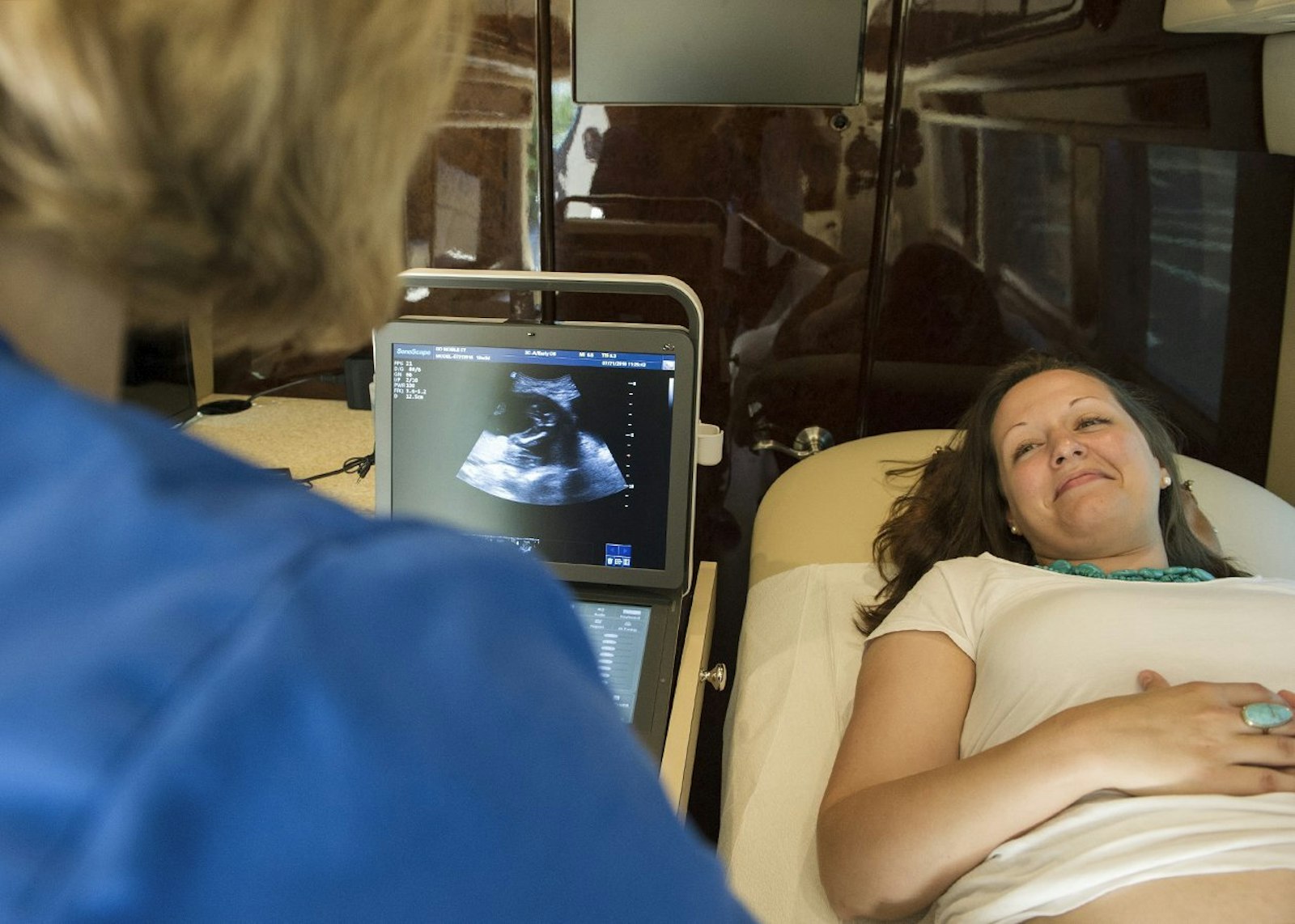 A medical professional speaks with an expectant mother during an ultrasound examination in this 2016 photo. (CNS photo/Thomas Serafin, courtesy Knights of Columbus)