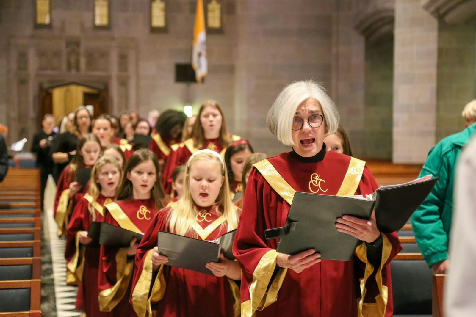 Susan Lindquist, director of the Cathedral Choir Academy of Detroit, leads youth singers in procession during last year's "Festival of Lessons and Carols" at the Cathedral of the Most Blessed Sacrament in Detroit. This year's event, part of the Cathedral Cultural Series, will take place Dec. 15. (Jeremy Bastyr | Special to Detroit Catholic)