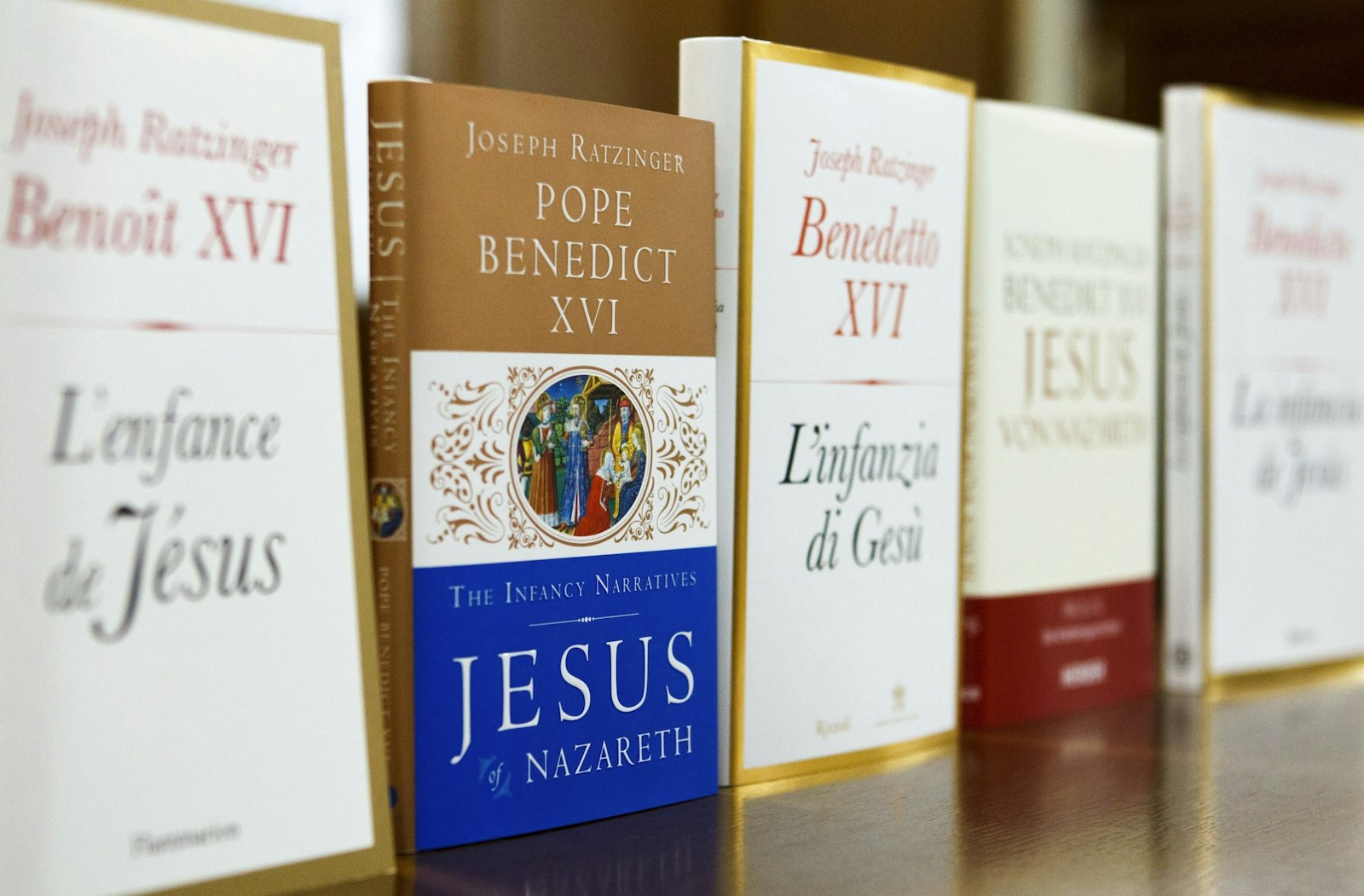 Pope Benedict XVI published three books in his "Jesus of Nazareth" series. Pictured are copies of the last in the series, "The Infancy of Jesus," displayed for the media in different languages at the Vatican in 2012. (CNS photo/Paul Haring)