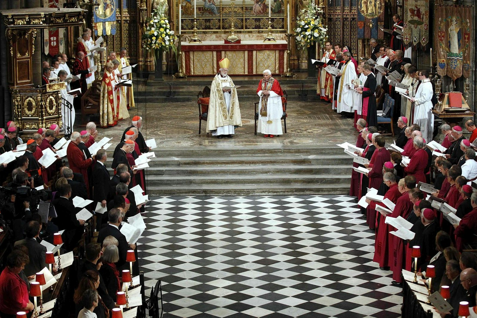 Anglican Archbishop Rowan Williams of Canterbury and Pope Benedict XVI lead evening prayer at Westminster Abbey in London Sept. 17, 2010. (CNS photo/Max Rossi, Reuters)