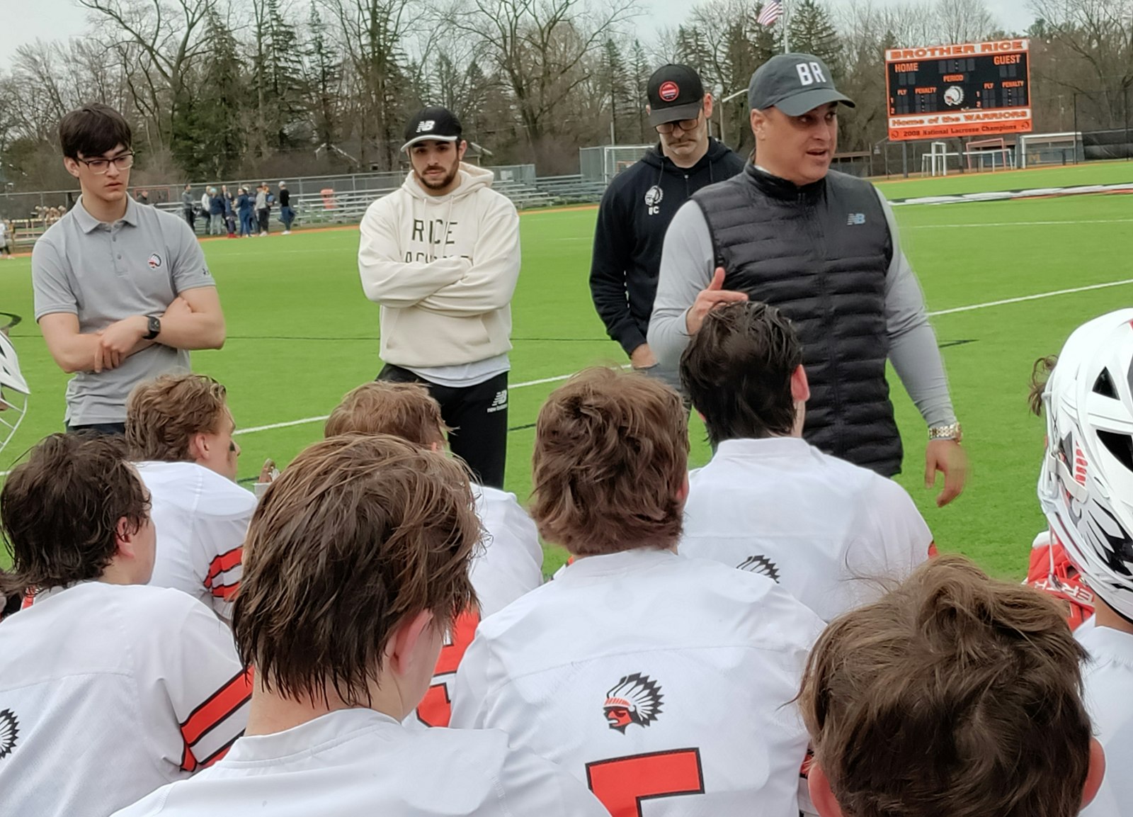 Brother Rice lacrosse coach Ajay Chawla challenged his squad after the Warriors trounced Hartland 21-6 to average the state final loss to Hartland a year ago. “Can we compete at a higher level?” The team faces three stiff tests in Ohio during Easter break. (Photo by Don Horkey | Special to Detroit Catholic)