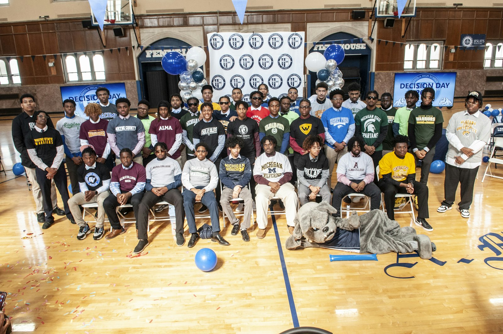 Thirty-eight seniors from Loyola High School in northwest Detroit announced their college decisions May 5 during the Jesuit school's annual "Decision Day," a celebration that also marks the school's 13th straight year of 100 percent college acceptance. Detroit Pistons announcer George Blaha was on hand to deliver opening remarks before students announced their future schools with friends and family cheering. (Photos courtesy of Loyola High School)