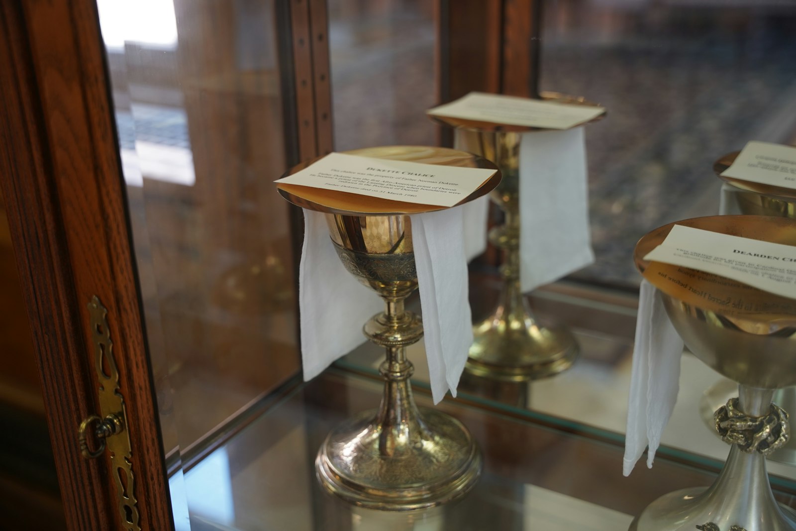 Fr. Norman DuKette's chalice is pictured on display at Sacred Heart Major Seminary among other historical artifacts. (Daniel Meloy | Detroit Catholic)