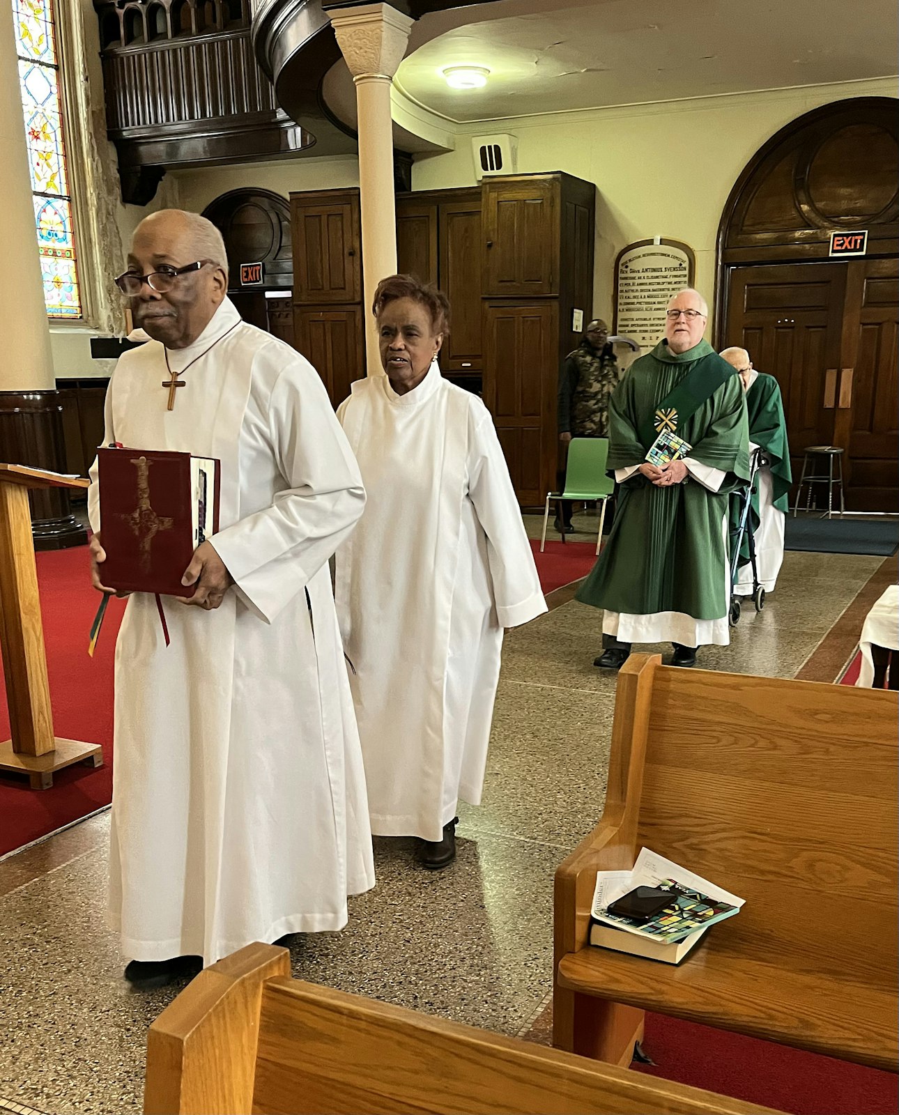 Deacon John Wright processes into St. Elizabeth Church in Detroit during a recent Sunday Mass. Each week, Deacon Wright leads a Communion service for approximately 10-20 inmates at the Macomb Correctional Facility in Lenox Township, sharing with them the word of God and offering spiritual care.