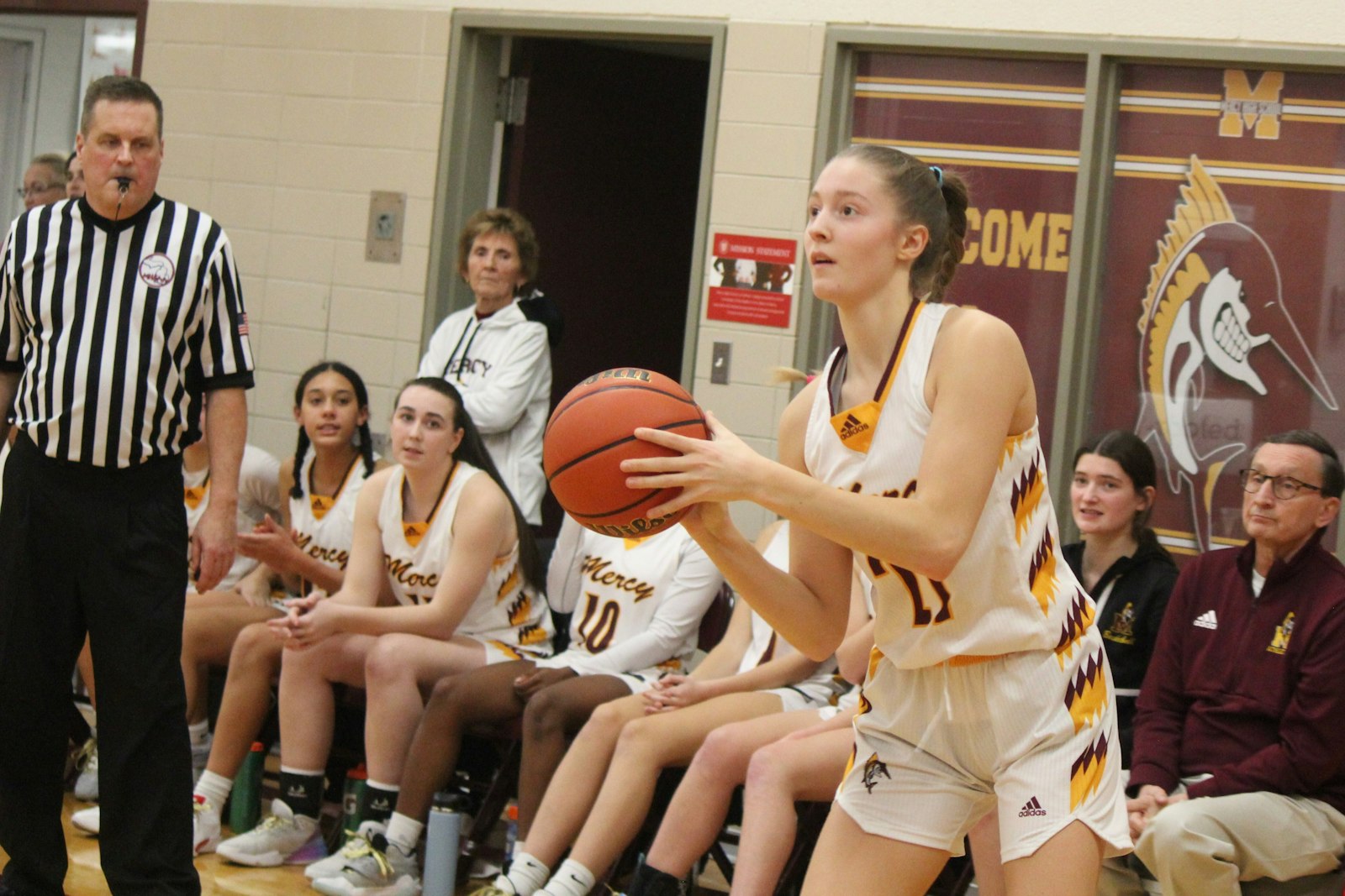 Mercy’s Aizlyn Albanese launches a three-pointer from the corner which gave Mercy a 57-41 lead early in the fourth quarter.