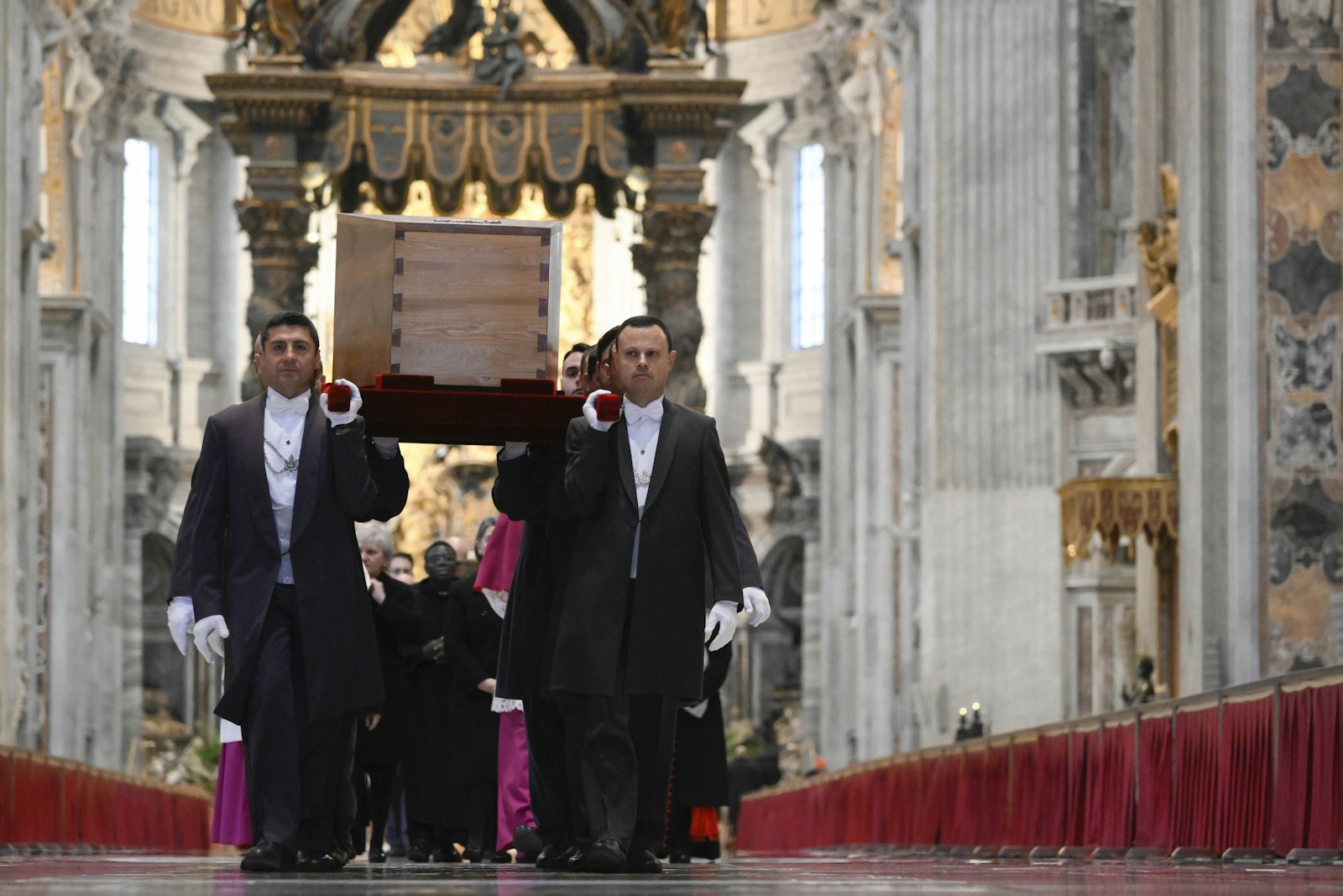 Pallbearers carry the casket of Pope Benedict XVI in St. Peter's Basilica during a procession to St. Peter's Square for the funeral of the late pope at the Vatican Jan. 5, 2023. (CNS photo/Vatican Media)