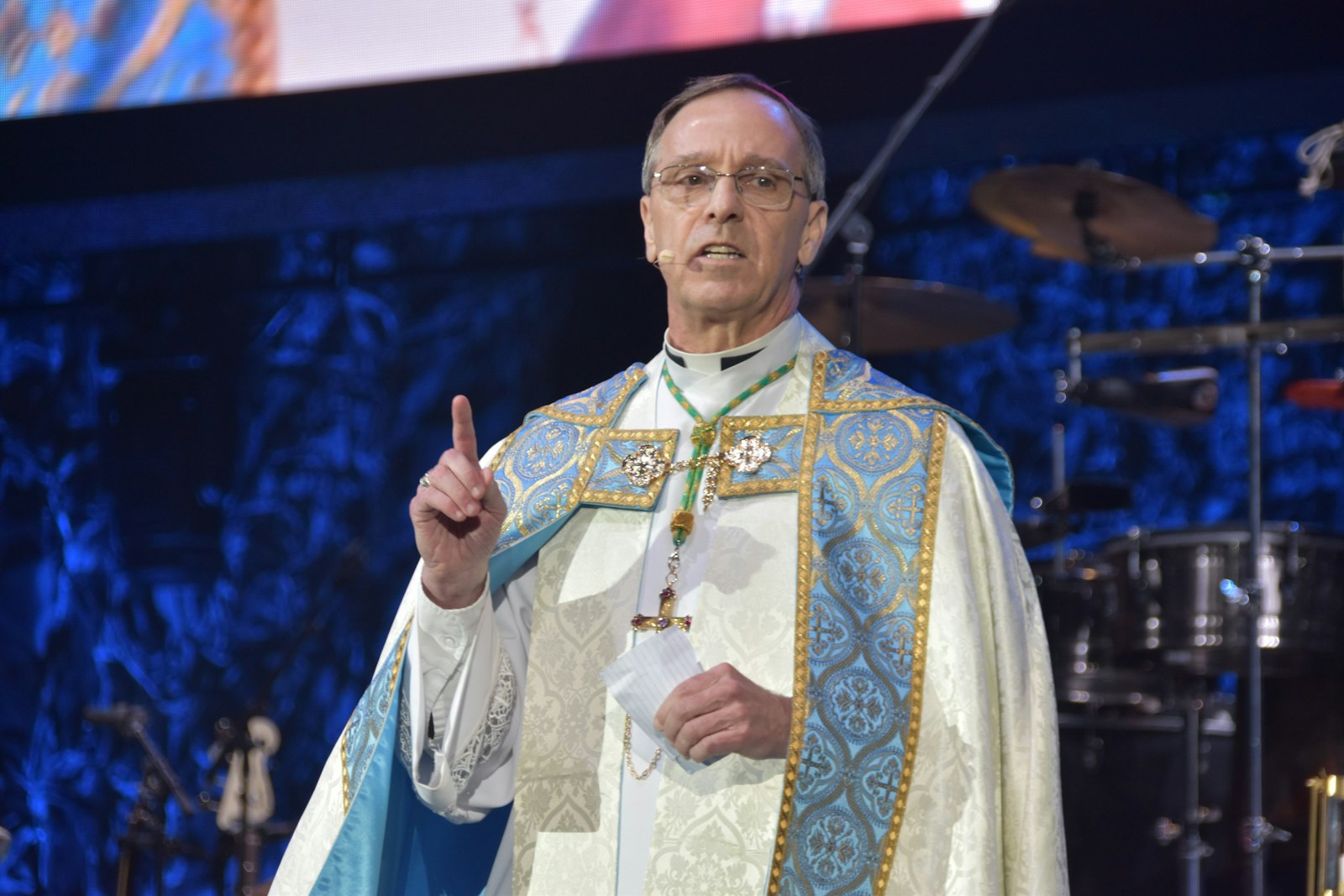 Indianapolis Archbishop Charles C. Thompson addresses more than 12,000 youths in Lucas Oil Stadium in Indianapolis during the opening session of the National Catholic Youth Conference on Nov. 16. (OSV News photo/Natalie Hoefer, The Criterion)