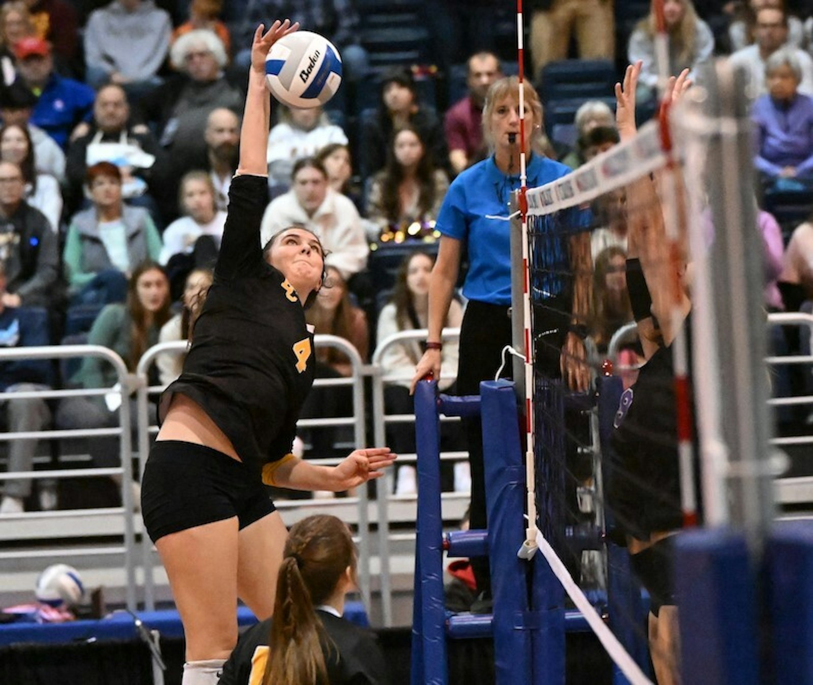 Everest outside hitter Sarah Bradley connects on one of her 31 kills in the Mountaineers' come-from-behind victory for the MHSAA Division 4 championship. “She’s an incredible leader,” her coach Danielle Walker said.