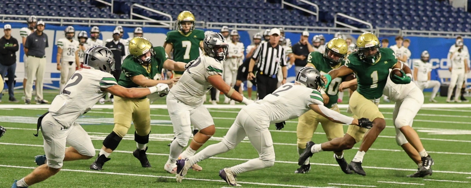 Kadale Williams (1) is on his way to one of five touchdowns he scored in Lumen Christi’s victory over Kalamazoo United for the Titans' second Prep Bowl win in a row. (Courtesy of Rick Bradley)