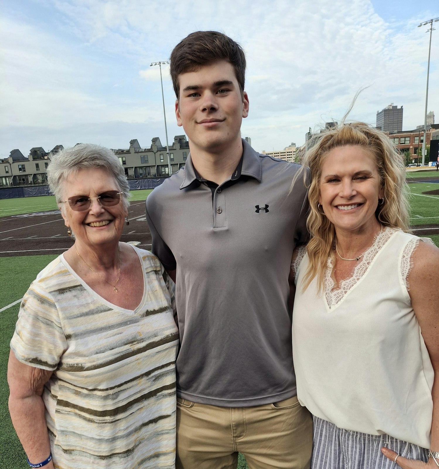 Brock O’Connell, the 2023-24 Walt Bazylewicz Winning Edge Scholarship Award recipient, celebrates the honor with his grandmother, Christine Nott, and mother, Michelle O’Connell. He will continue his academic and hockey career at Adrian College.