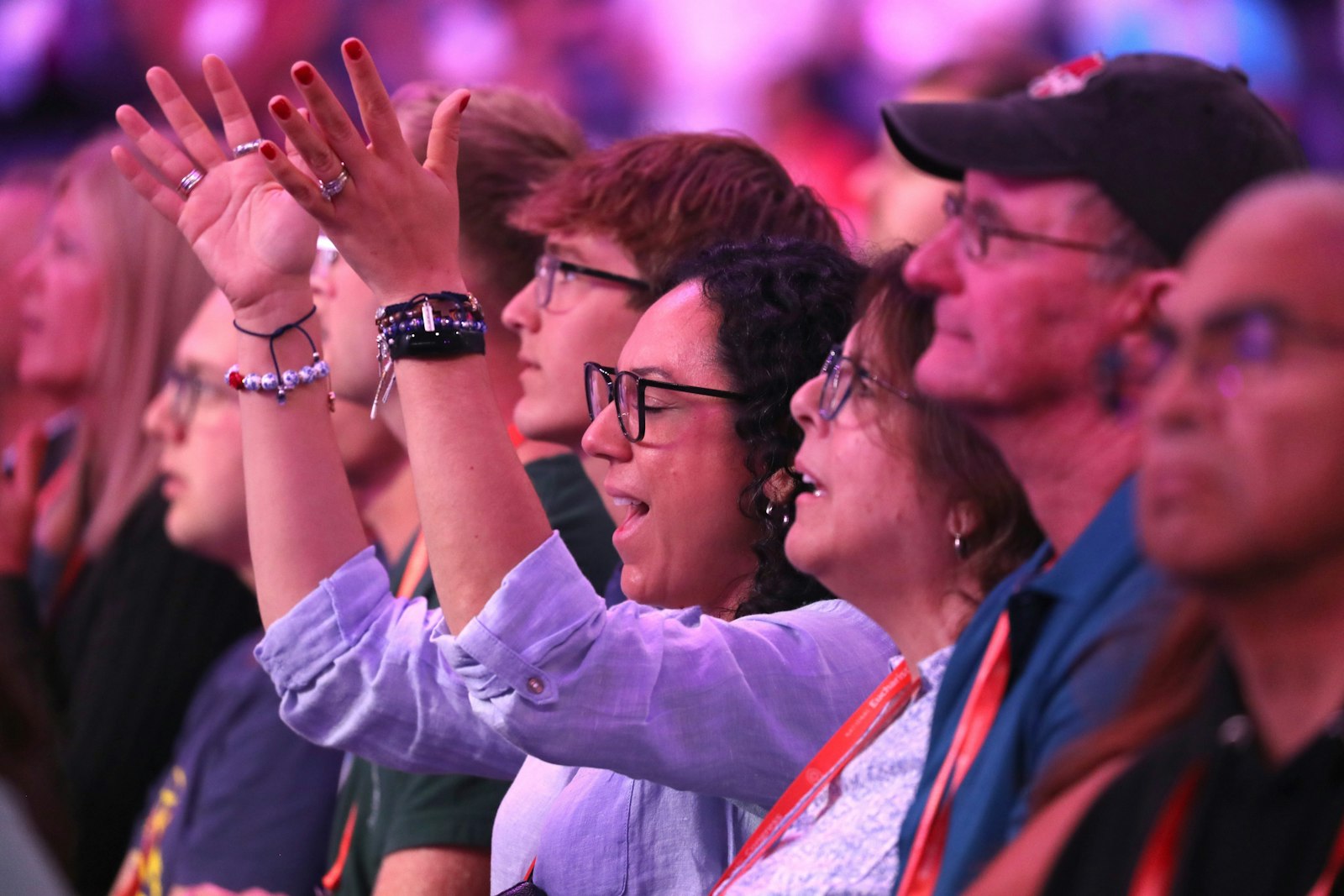 Pilgrims pray during a July 19, 2024, Encounter impact session at Lucas Oil Stadium during the National Eucharistic Congress in Indianapolis. (OSV News photo/Bob Roller)