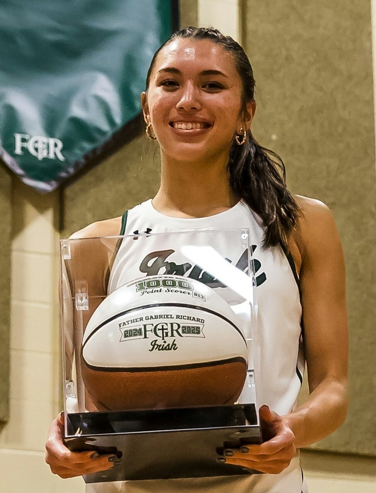 Charlotte Miller, senior captain of the Ann Arbor Fr. Gabriel Richard girls’ basketball team, holds the school record for career points, three-pointers made, steals, and assists. (Photo courtesy of Ann Arbor Father Gabriel Richard)