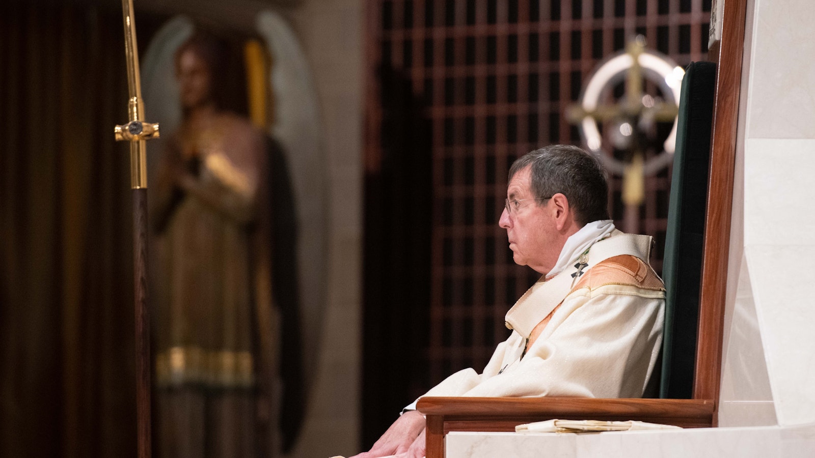 Archbishop Vigneron sits in his cathedra — his episcopal seat — at the Cathedral of the Most Blessed Sacrament during a Mass of consecration for two consecrated virgins on Sept. 25, 2021. (Tim Fuller | Special to Detroit Catholic)