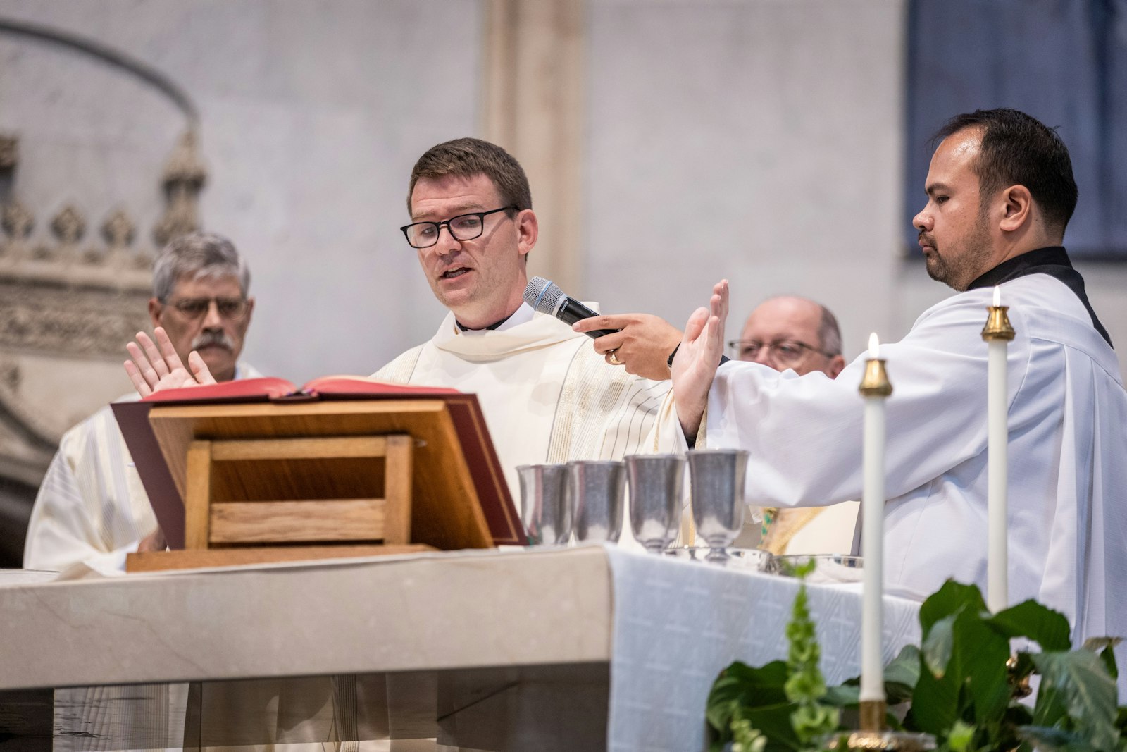 Fr. Daniel J. Dixon, SJ, prays at his ordination Mass at the Church of the Gesu in Milwaukee on Saturday, June 10. (Art Montes | Special to Detroit Catholic)