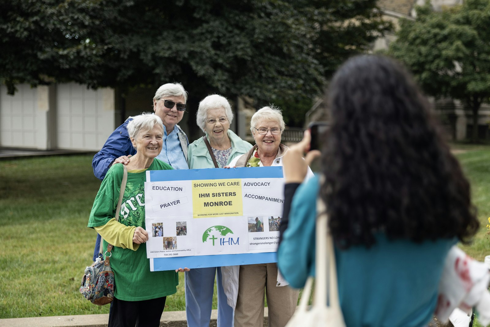 Sisters, Servants of the Immaculate Heart of Mary of Monroe display a sign in support of immigration reform. Strangers No Longer is hosting a day of action in Lansing on Nov. 12 in support of "Drive Safe" bills that will allow immigrants to qualify for driver's licenses and state IDs, regardless of immigration status.