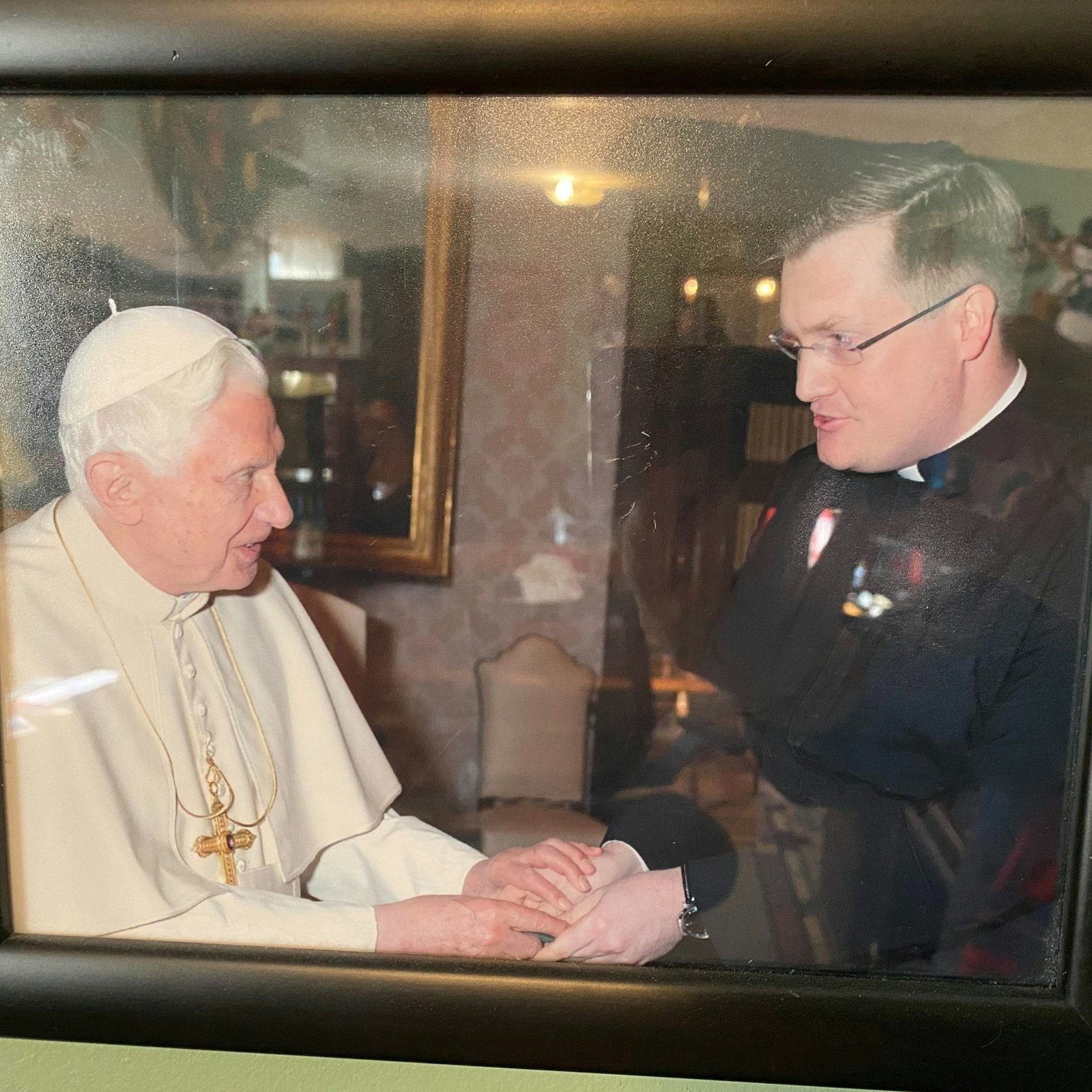 Fr. Charles Fox met the late Pope Benedict XVI during an ad limina visit alongside Archbishop Allen H. Vigneron in 2012. (Courtesy of Fr. Charles Fox)