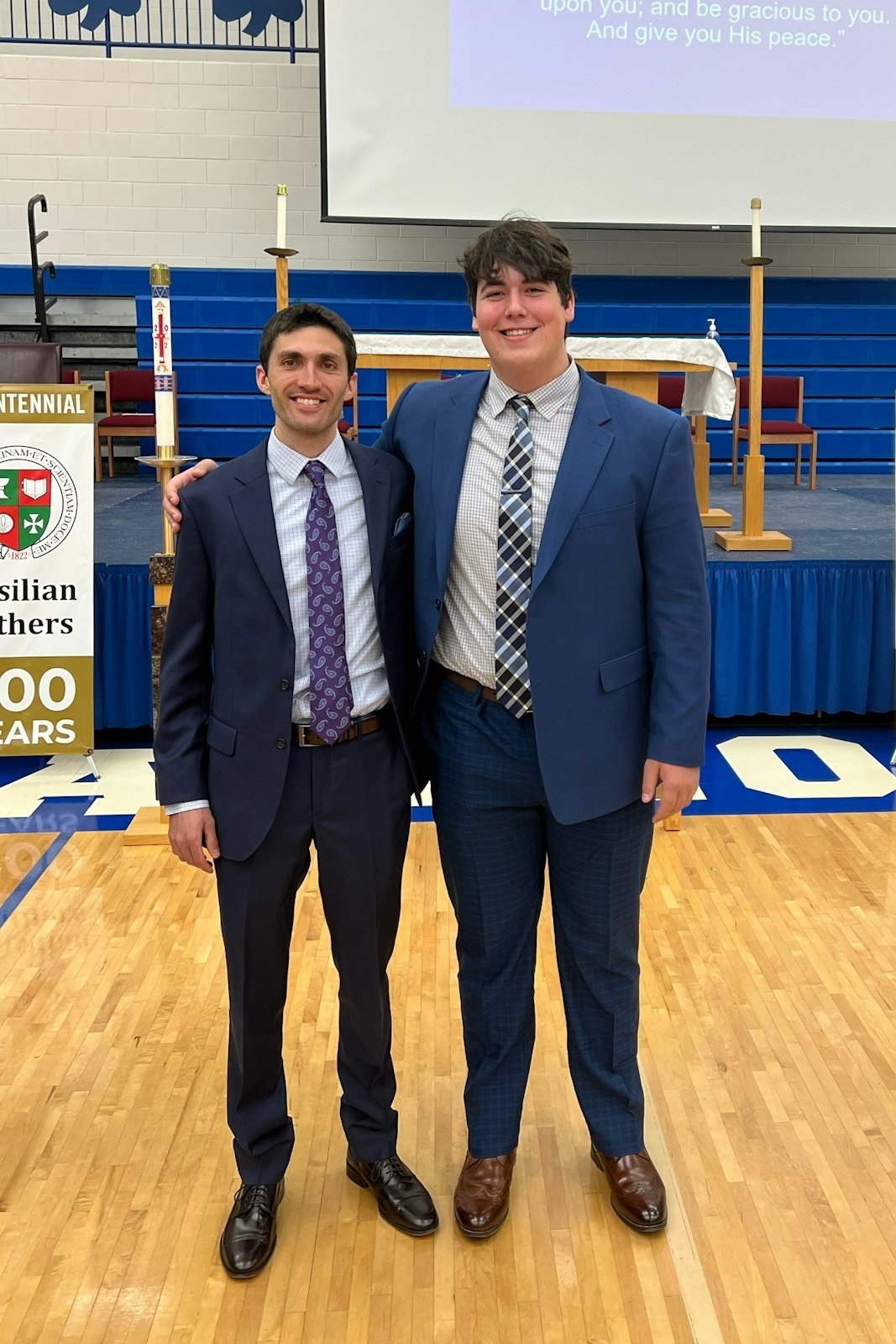 Theology teacher Colin Whitehead, left, is a Catholic Central alumnus who served on the formation team and was Keeley's confirmation sponsor. (Photo courtesy of Colin Whitehead)