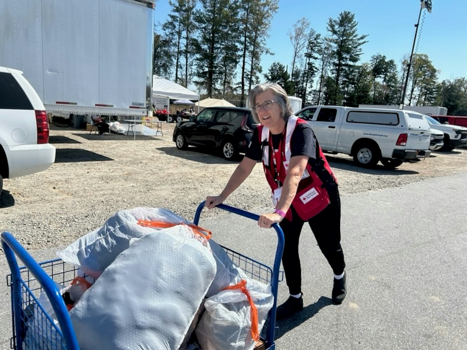 St. Clare of Montefalco parishioner Barbara Koster is a volunteer with the American Red Cross and is currently deployed in Asheville, North Carolina. Koster works 7 a.m. to 7 p.m. shifts at one of the Red Cross’s emergency shelters and interacts daily with displaced persons and flooding victims. (Photo courtesy of Barbara Koster)