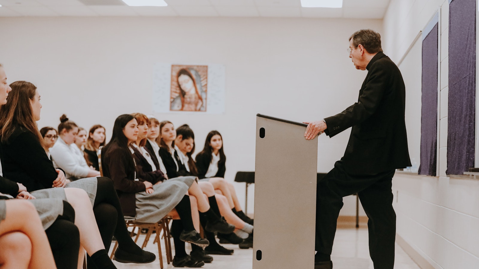 Archbishop Vigneron leads a question-and-answer session with students at St. Catherine of Siena Academy in Wixom during a pastoral visit to the school April 2, 2019. (Melissa Moon | Detroit Catholic file photo)
