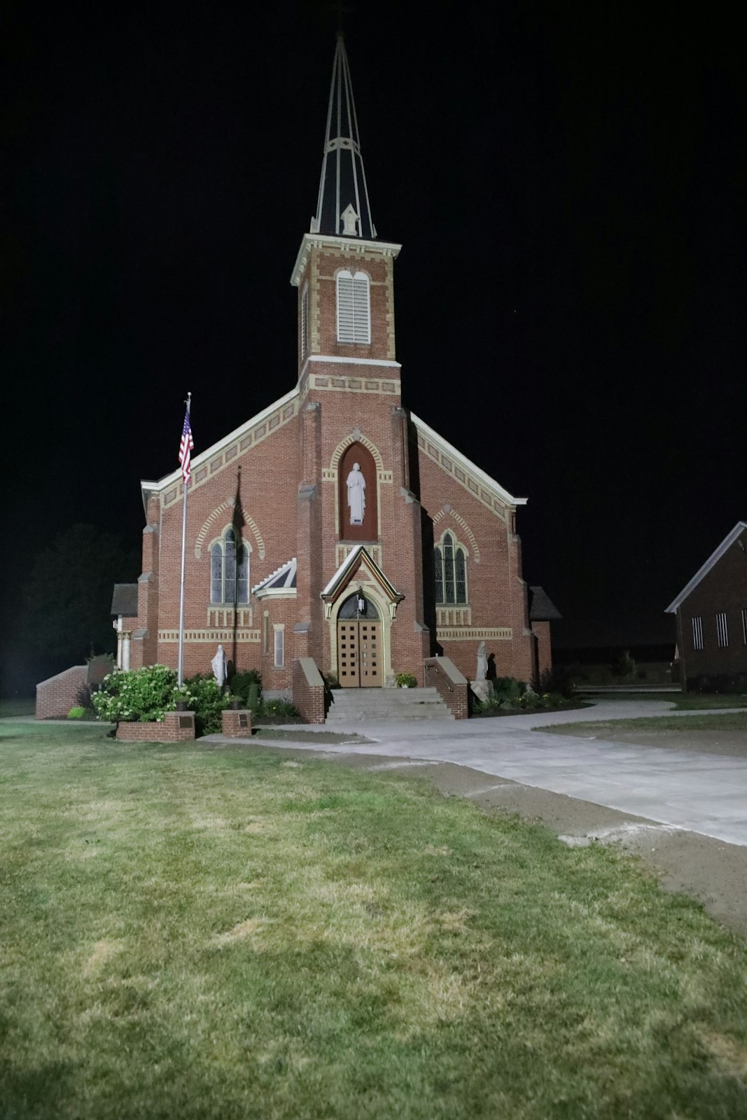 St. Charles Borromeo Church in Newport is pictured before dawn Wednesday, July 27. For those using the adoration chapel at night, the chance to pray while the world is silent offers special graces, Flint said.