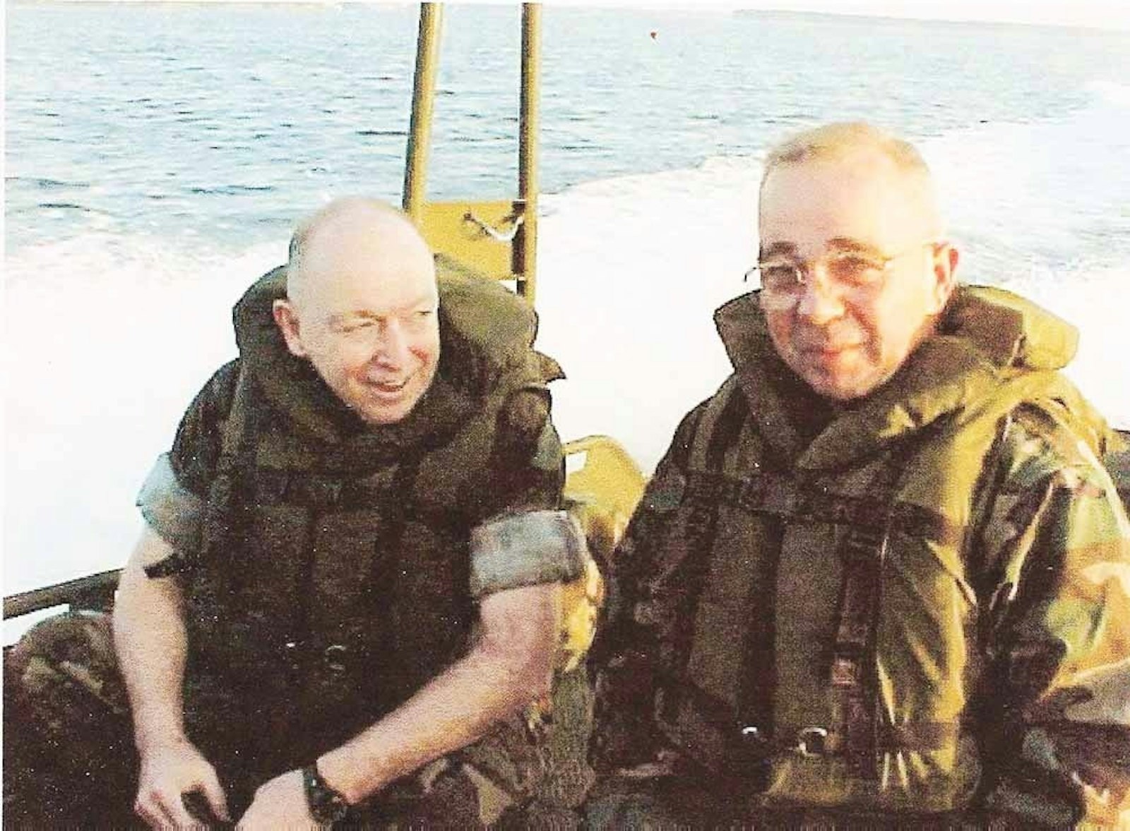 Msgr. John Kaul, left, and Protestant minister Tom Giuntoli head for Mass in 2001 at Camp Lejeune in North Carolina. (Archive photo)