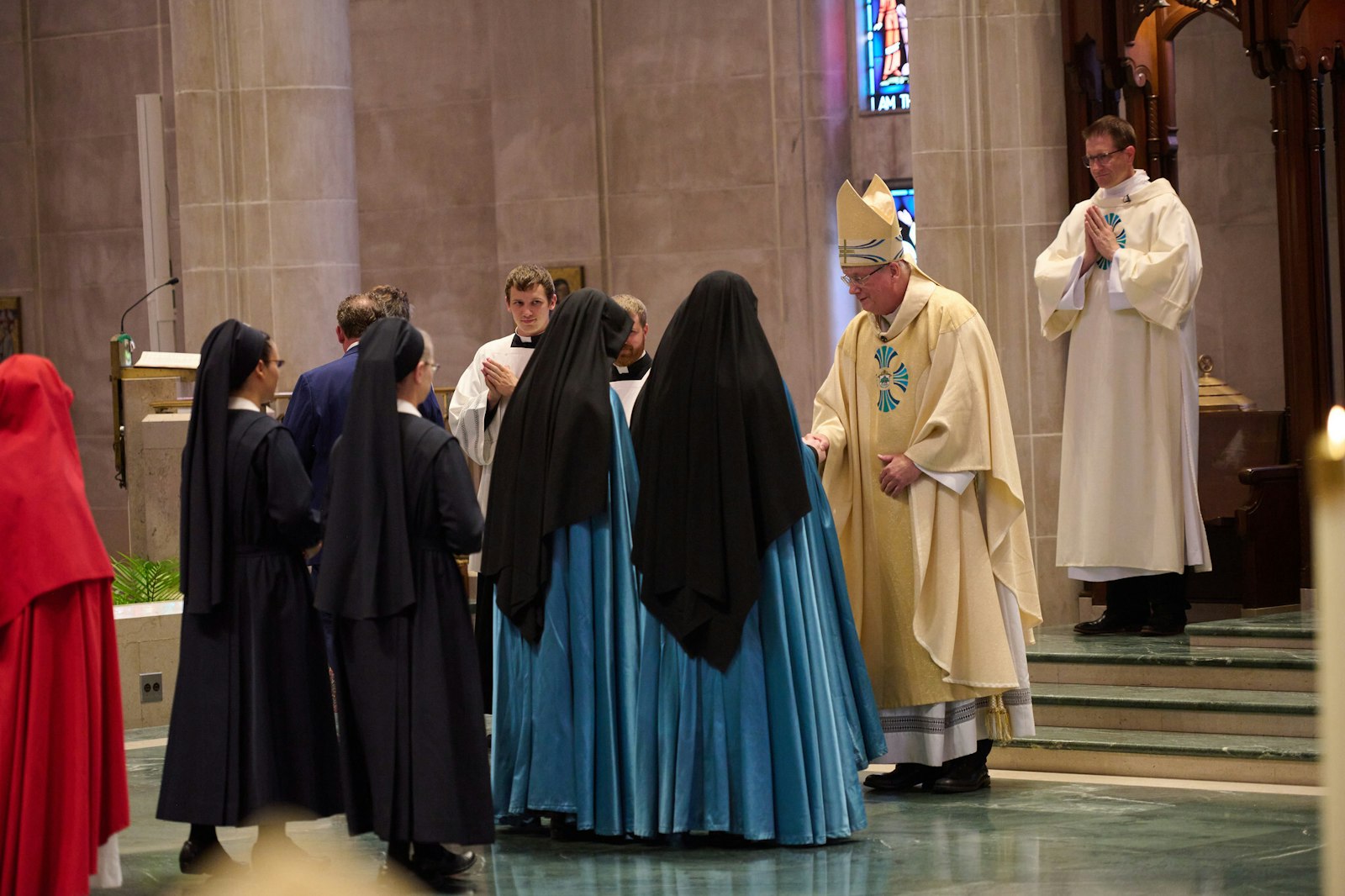 Bishop Battersby is greeted by representatives of the Diocese of La Crosse during the installation Mass.