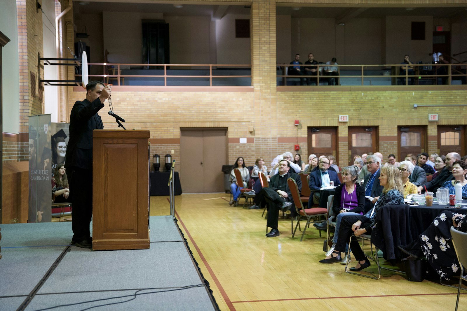 In his talk, Fr. Calloway launched into the history of the rosary and the power it has wielded in times of distress throughout history, beginning with its origins as a weapon given to St. Dominic as he tried to evangelize heretics in France who were denying tenets of the Catholic faith.