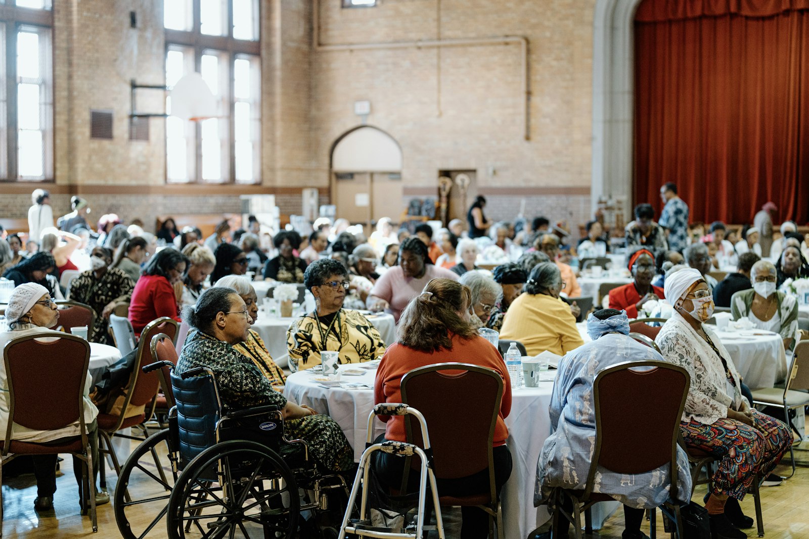 Sacred Heart's gymnasium is filled with women during the annual Black Catholic Women's Conference on Aug. 10.