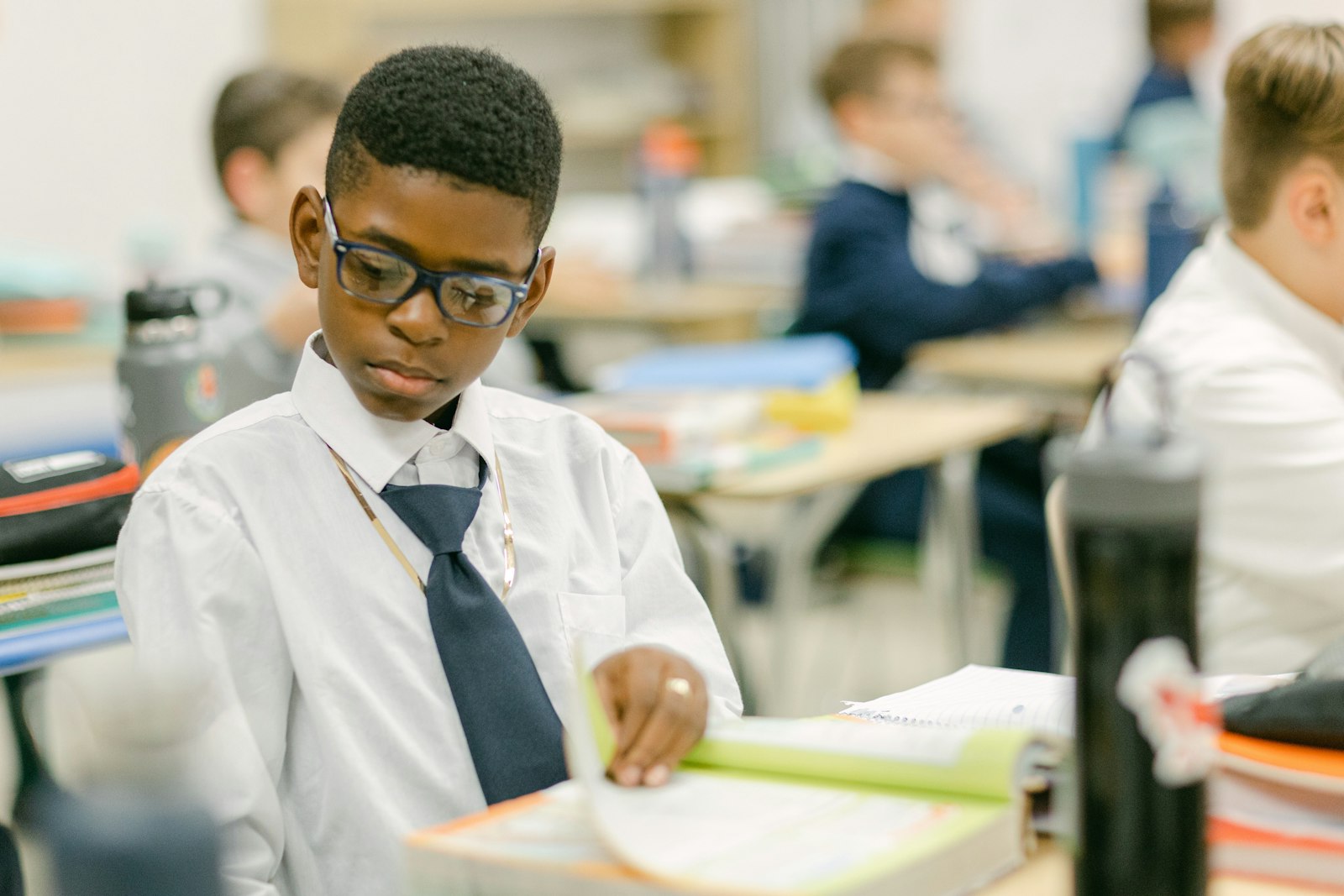 A student completes his assignment during a class at St. Anne Catholic School in Warren. Across the Archdiocese of Detroit, Catholic schools have seen steady or increasing enrollment, with leaders able to retain an influx of new families who discovered Catholic education during the pandemic and have become integrated into the school community.