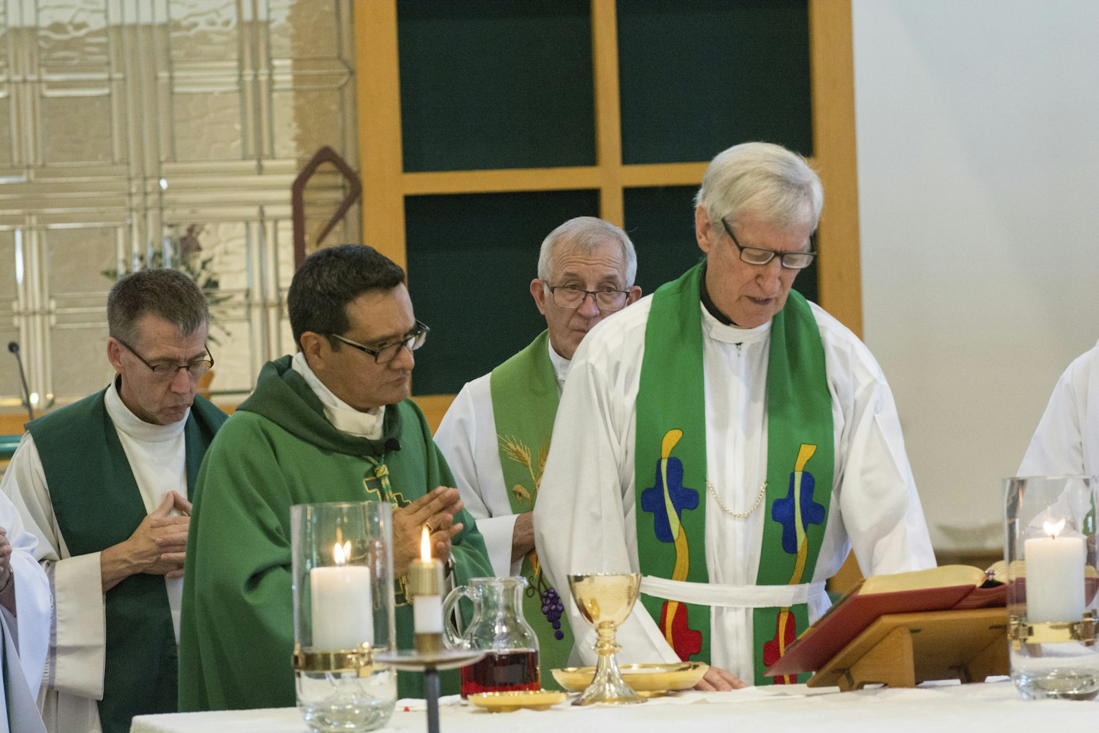 Fr. Frawley, right, celebrates Mass at St. Anne Parish in Ortonville alongside Auxiliary Bishop Arturo Cepeda and priests of neighboring parishes. (Courtesy photo)