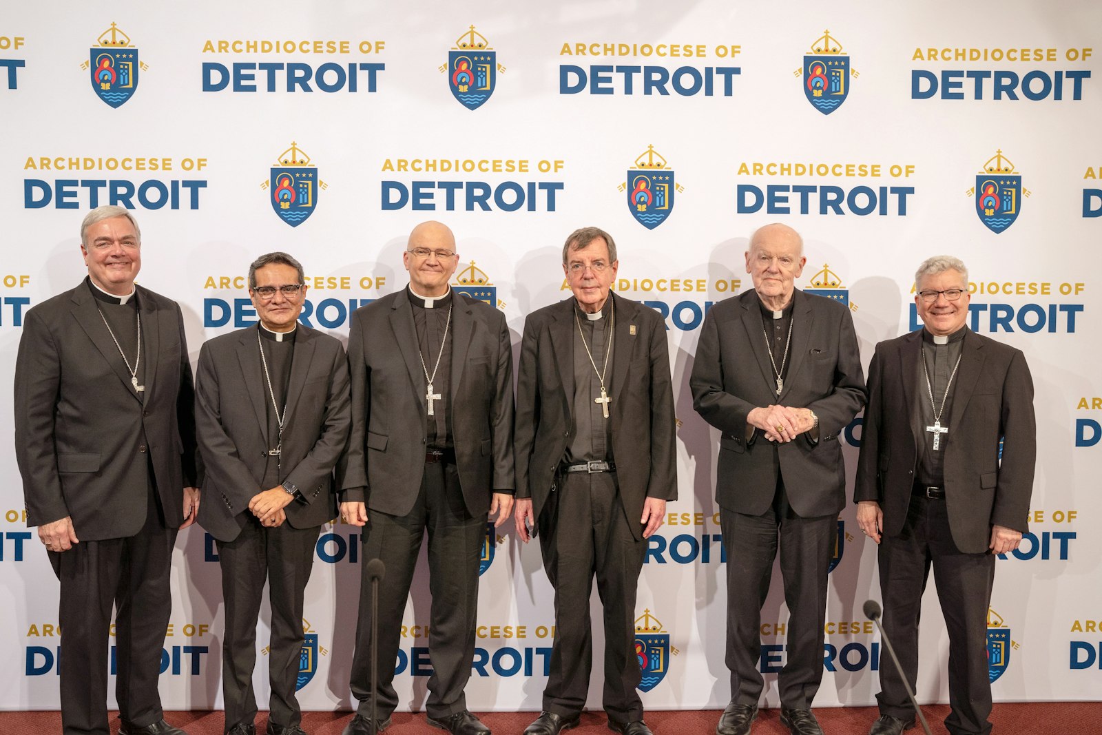 Several bishops were in attendance during the introductory news conference, including (from left), Detroit Auxiliary Bishop Robert J. Fisher, Detroit Auxiliary Bishop Arturo Cepeda, Archbishop-elect Edward J. Weisenburger, Archbishop Allen H. Vigneron, retired Grand Rapids Bishop Walter A. Hurley, and Detroit Auxiliary Bishop Jeffrey M. Monforton.