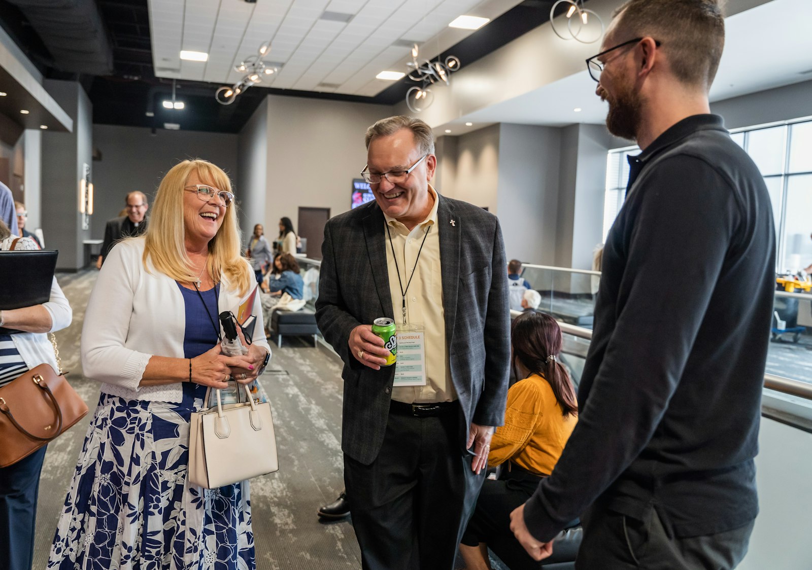 Curia and parish leaders chat in between sessions June 28 during the Missionary Renewal Assembly at the Suburban Collection Showplace in Novi. The assembly included breakout sessions where leaders from Families of Parishes discussed common challenges and opportunities to evangelization.