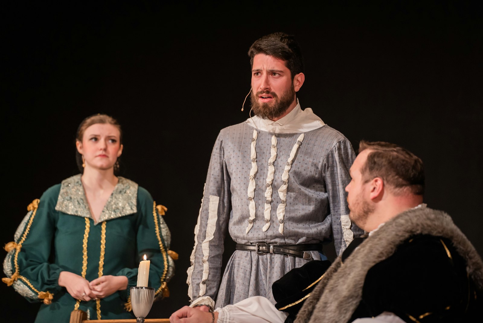 Rhonwyn Martin (Lady Margaret More), Joseph Lennon (William Roper), and Deacon Andrew Smith (Sir Thomas More) act out a scene on stage. The seminarians consulted their canon law professor, an expert on St. Thomas More, to ensure the performance was true to the saint's life.