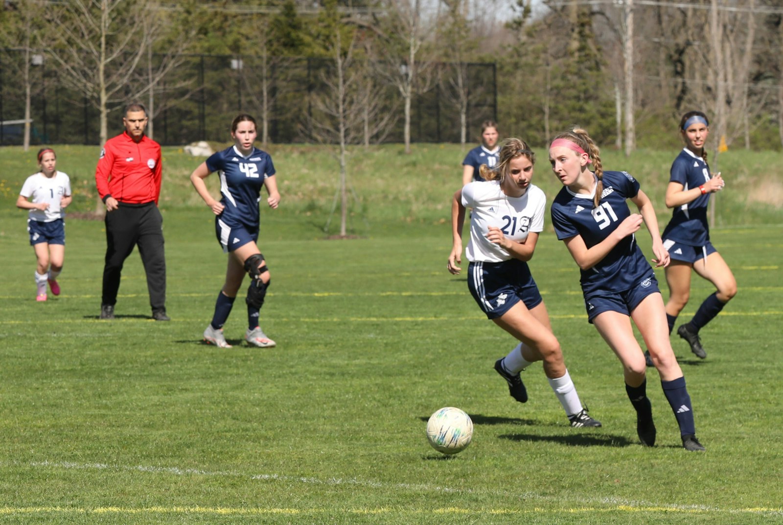 Senior Morgan McNally looks to pass to an open Sacred Heart teammate. McNally was a team captain on the cooperative Sacred Heart-Clarkston Everest Collegiate squad which fell to Kalamazoo Christian in last spring’s Division 4 state championship contest.