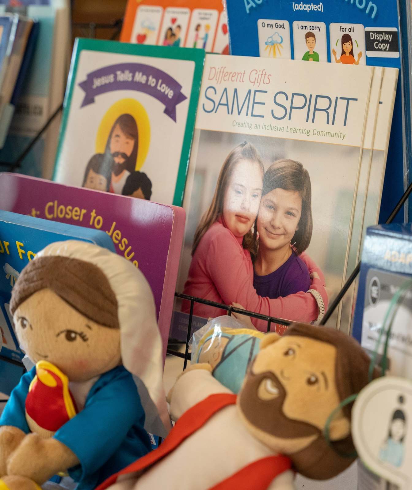 Books and children's toys promoting inclusivity for those with disabilities are pictured at the conference on Aug. 5. (Valaurian Waller | Detroit Catholic)