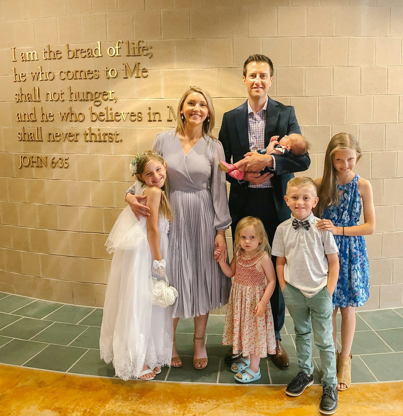 The Kidman family is pictured at Our Lady of Good Counsel Parish in Plymouth during daughter Audrey's first Communion celebration.